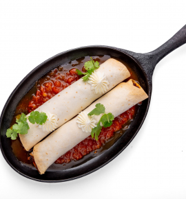Enchilada with minced beef, red beans and tomato salsa sauce